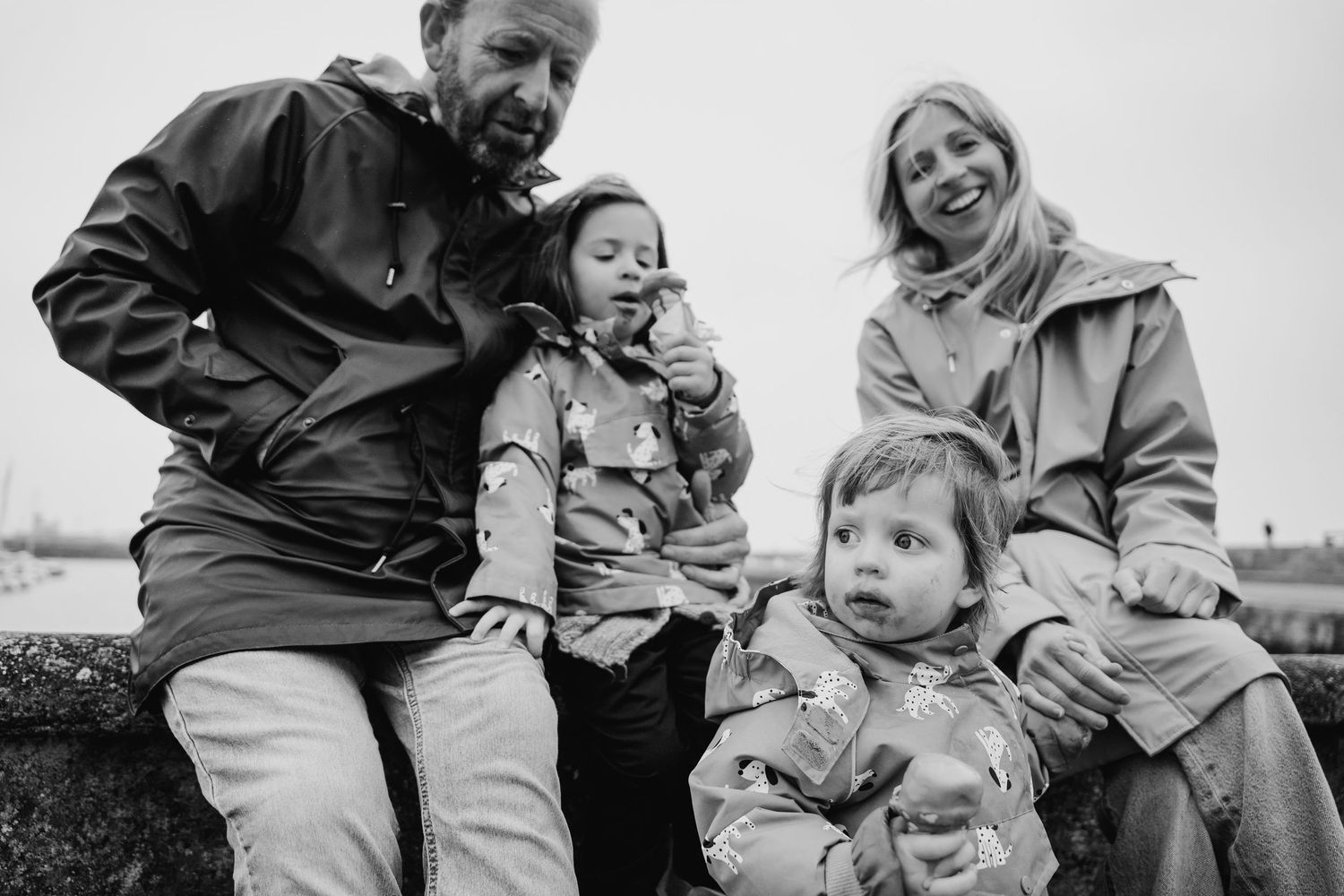 Black and white candid family photos showing intimate moments of connection and laughter. PHOTOGRAPHER Dublin