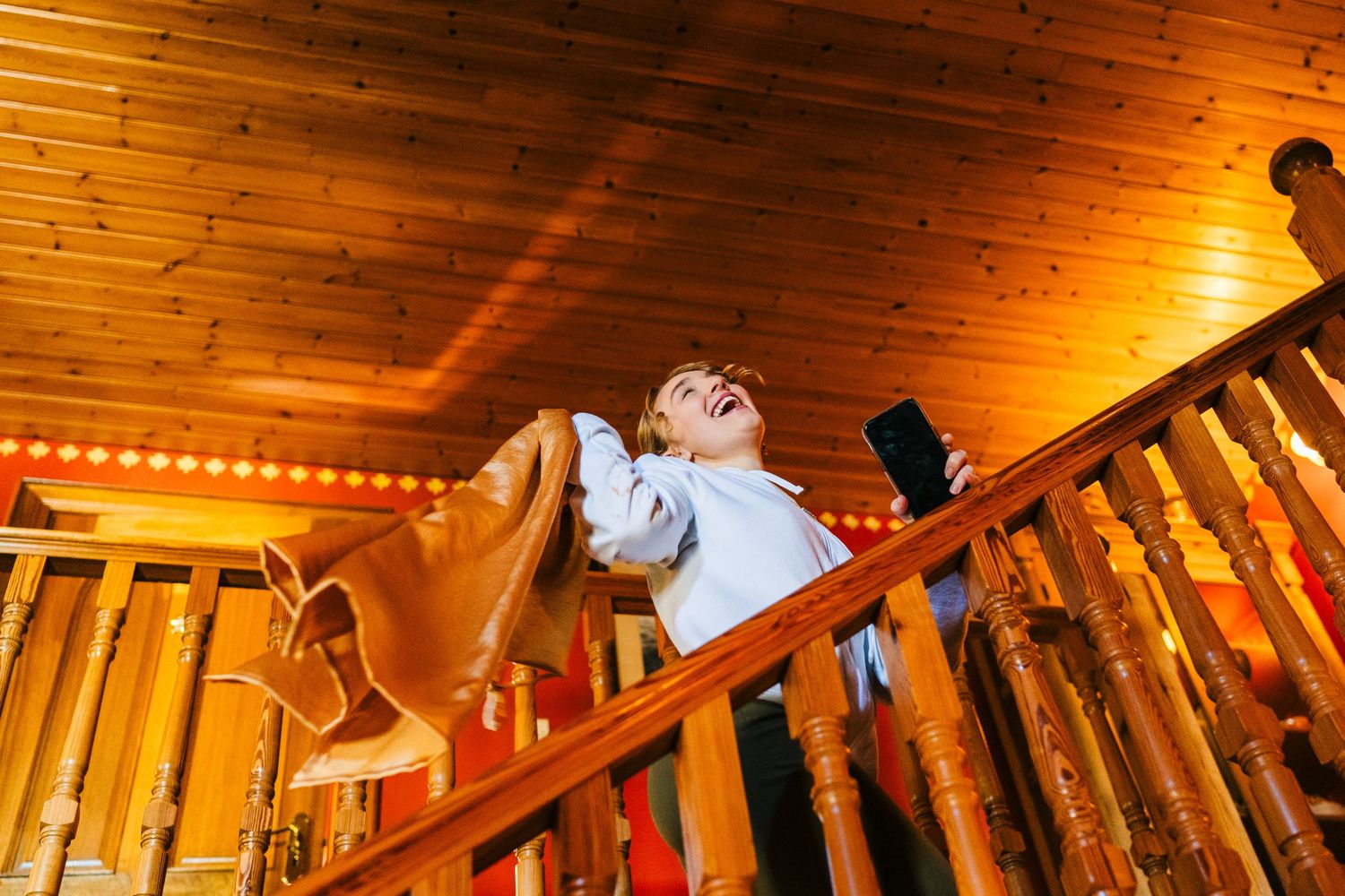 Poulaphouca Wedding photographer wicklow  Rustic wooden ceiling venue decorated with warm lighting for an evening wedding reception.