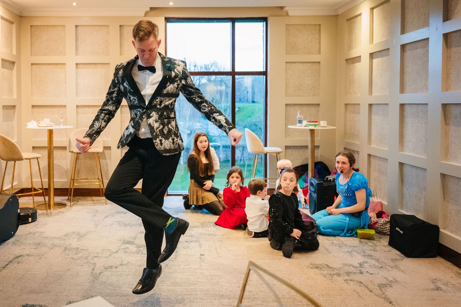 Dance class or wedding choreography practice in a bright studio space.  Wedding PHOTOGRAPHER Trim Castle