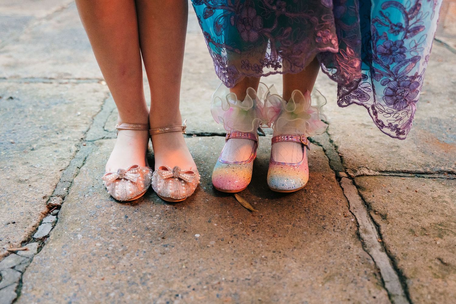 Row of womens feet in formal shoes standing on stone pavement. Marco Pierre Dublin Wedding Photographer
