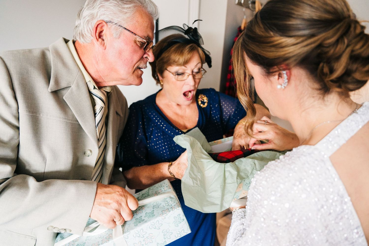 Emotional wedding moments shared between loved ones during an indoor celebration. House Dublin Wedding Photographer