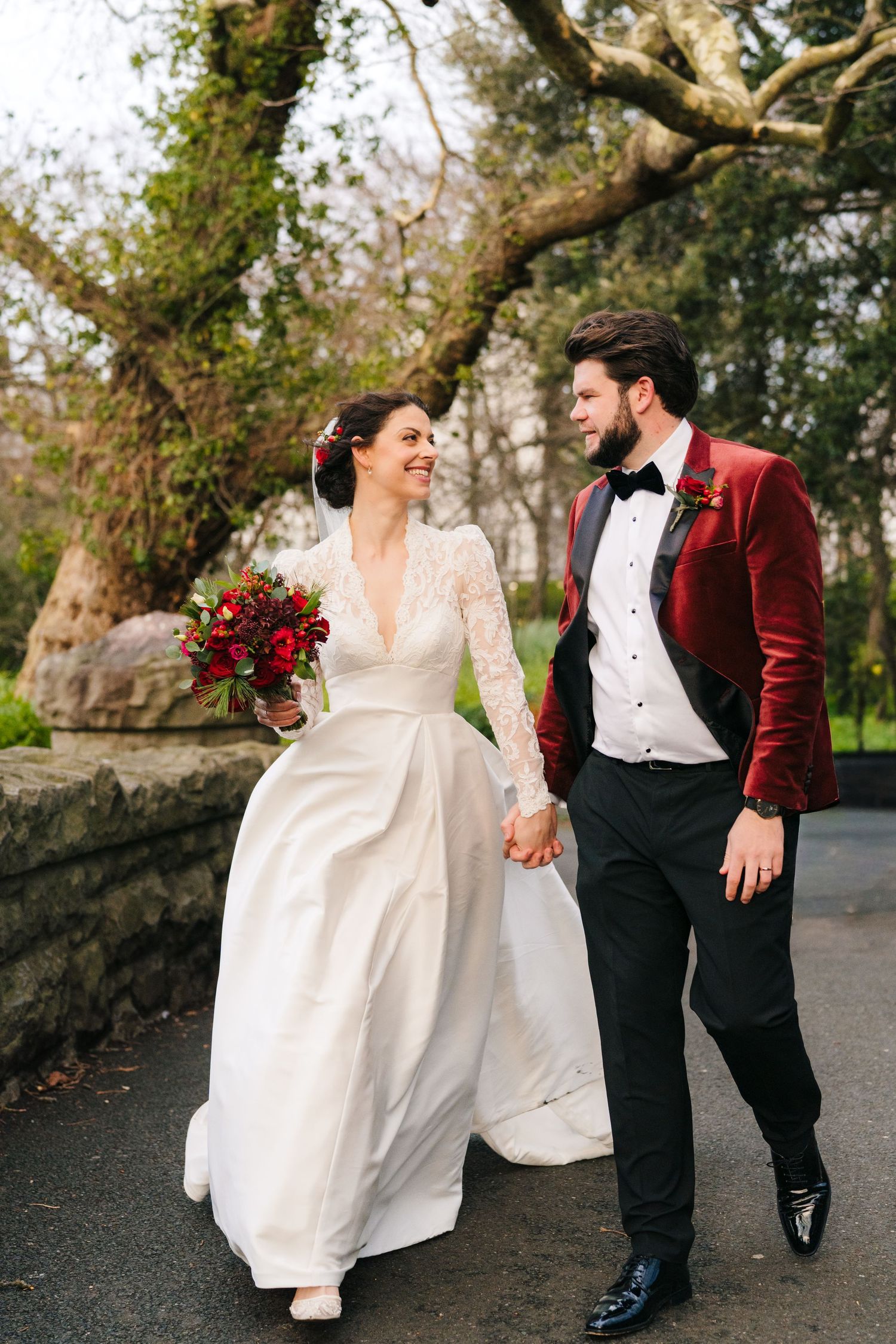Couple walks together on path. Wedding photographer dublin meath cavan. Stephens green club dublin Wedding photographer