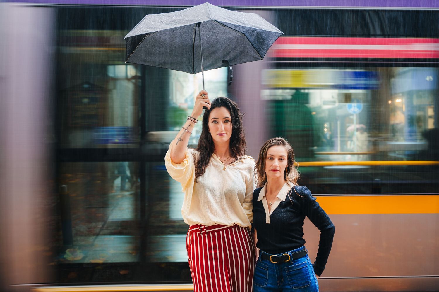 Urban dance scene with motion blur of passing bus in background on city street. professional headshots dublin photographer