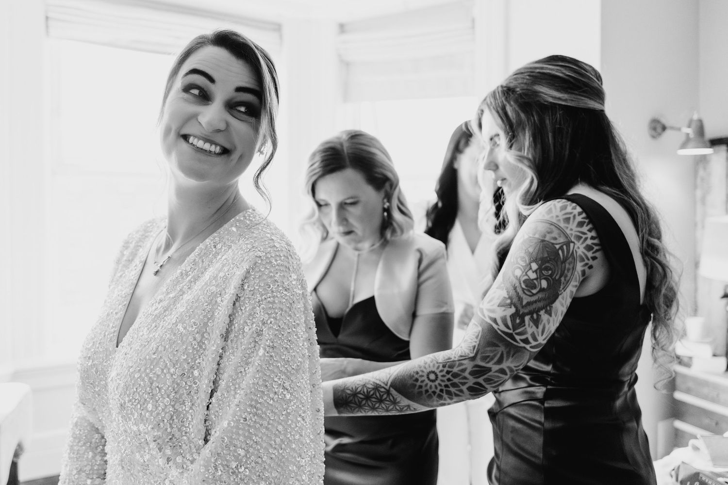 Candid black and white shots of wedding day preparation moments. House Dublin Wedding Photographer