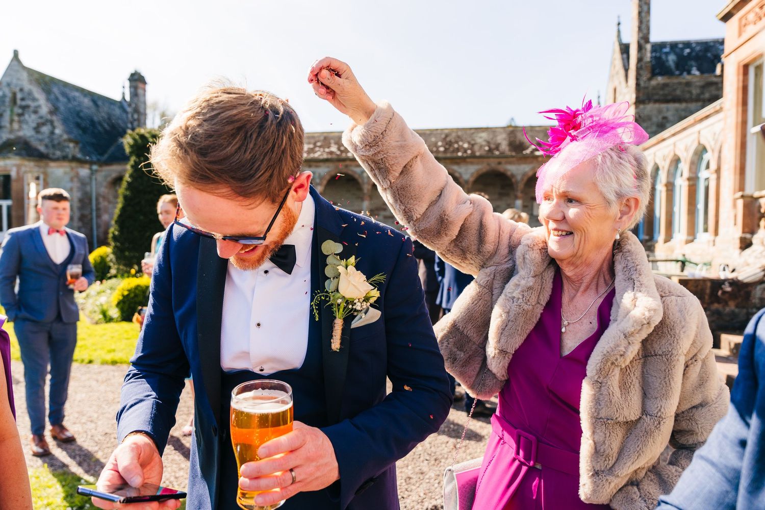 Castle Leslie Wedding Photographer Dublin Wedding guests dance and mingle during outdoor celebration.