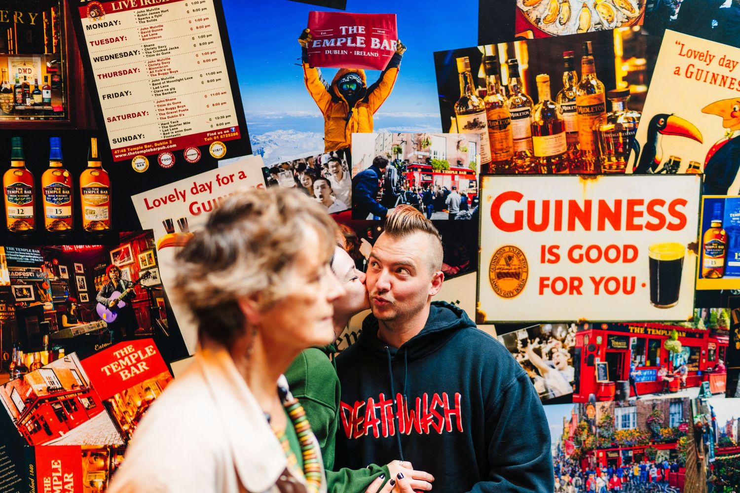 Vibrant collage featuring Guinness beer advertisements and pub scenes in Dublin, Ireland. PHOTOGRAPHER Dublin Ireland