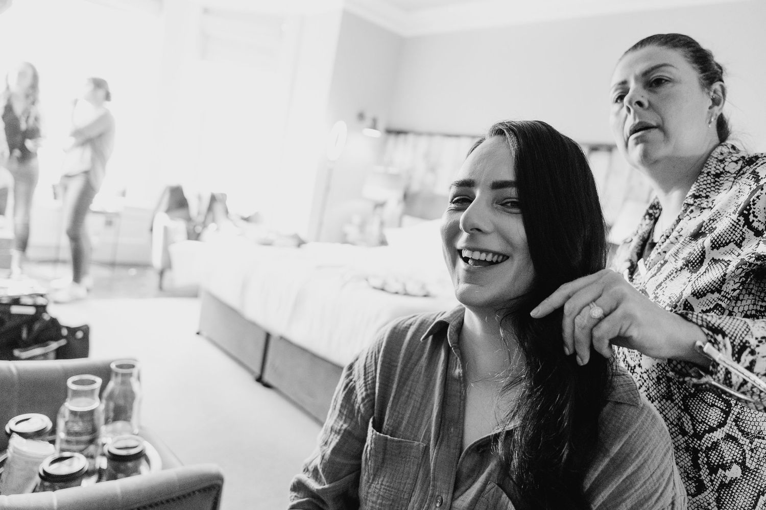 A collage of candid black and white lifestyle moments showing laughter and joy during informal gatherings. House Dublin Wedding Photographer
