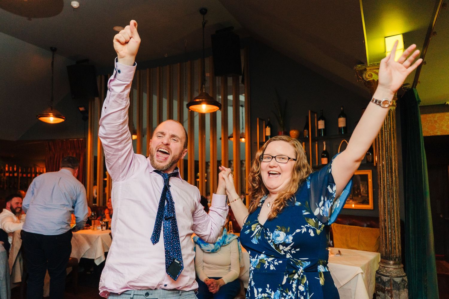 Energetic dance floor scene during a wedding reception celebration. Marco Pierre Dublin Wedding Photographer