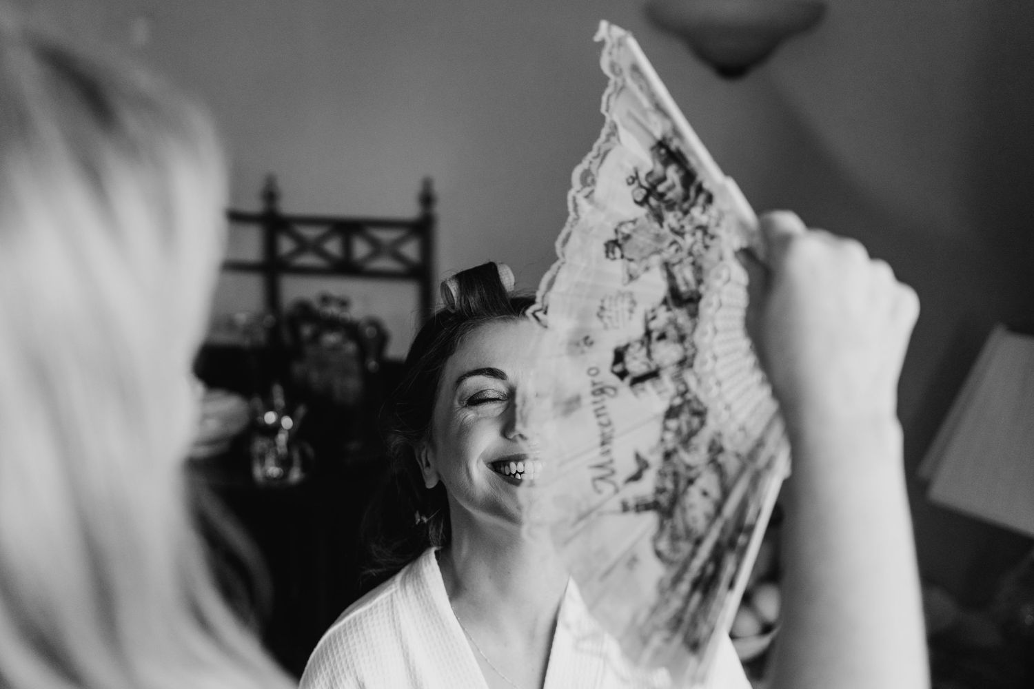 Castle Leslie Wedding Photographer Dublin Black and white sequence of a bride getting ready with her wedding veil on her wedding day.