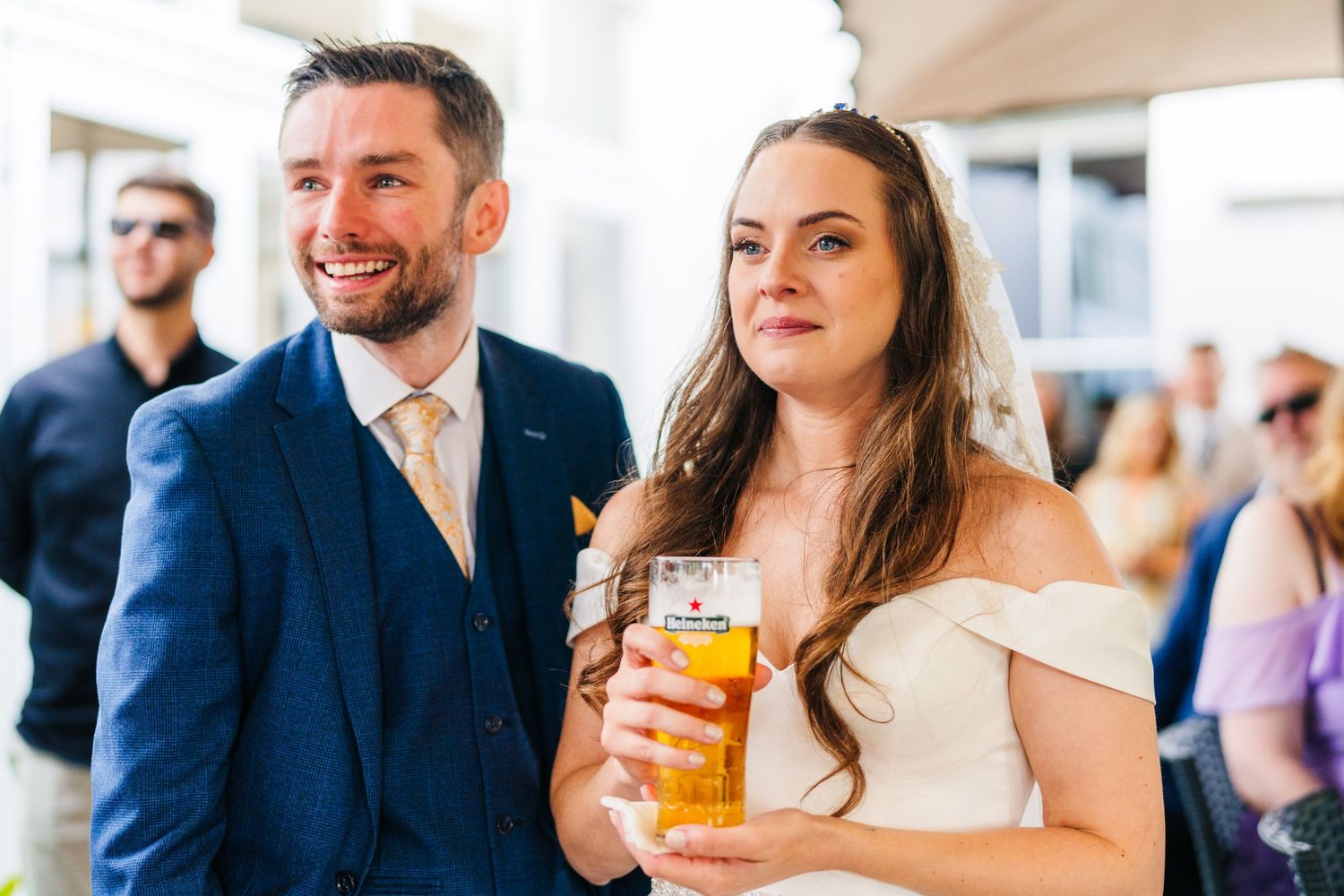 Poulaphouca Wedding photographer wicklow  Couple enjoying drinks at outdoor wedding reception.