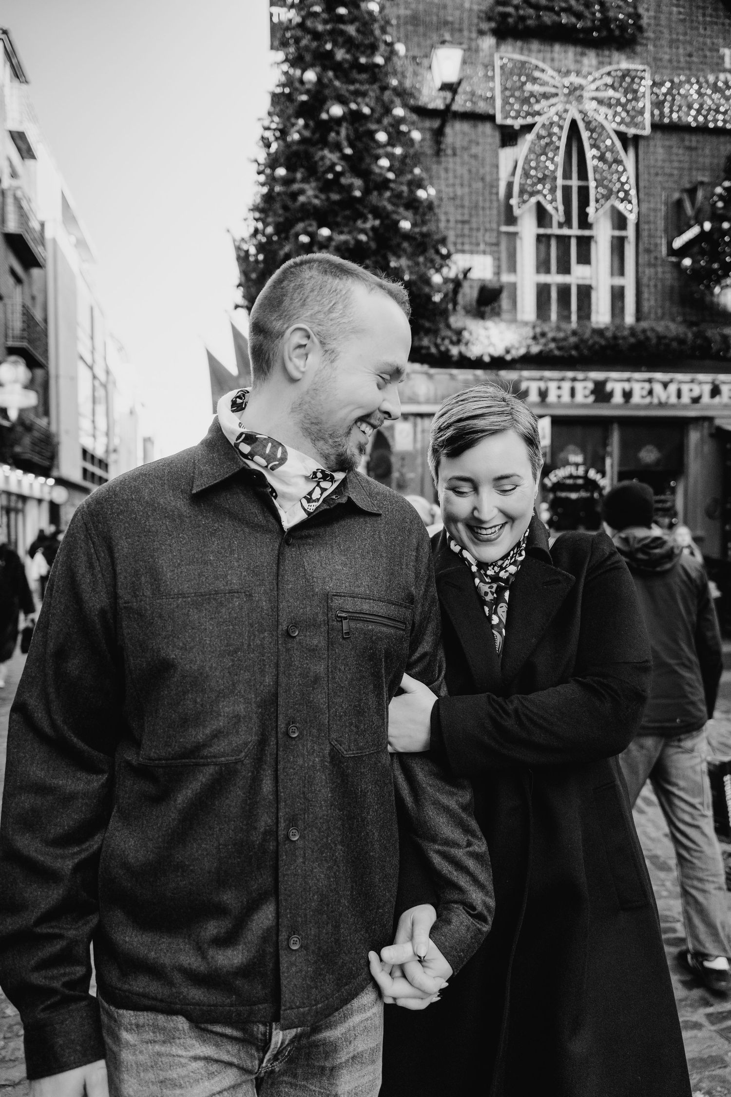 Family walking through Dublin city centre during a relaxed vacation photo session with a family photographer Dublin