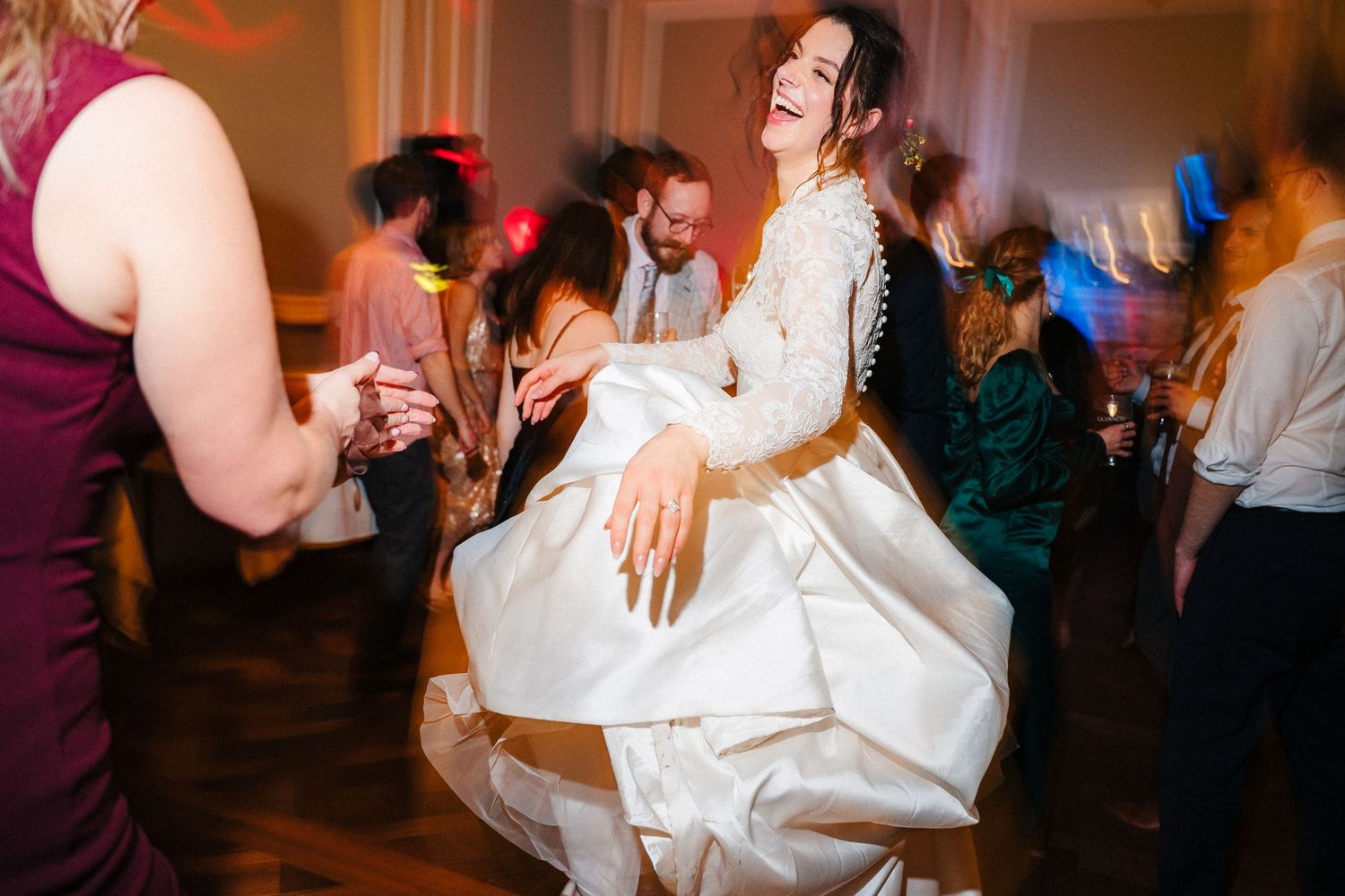 Wedding reception dance floor filled with joyful celebration and movement. Stephens green club dublin Wedding photographer