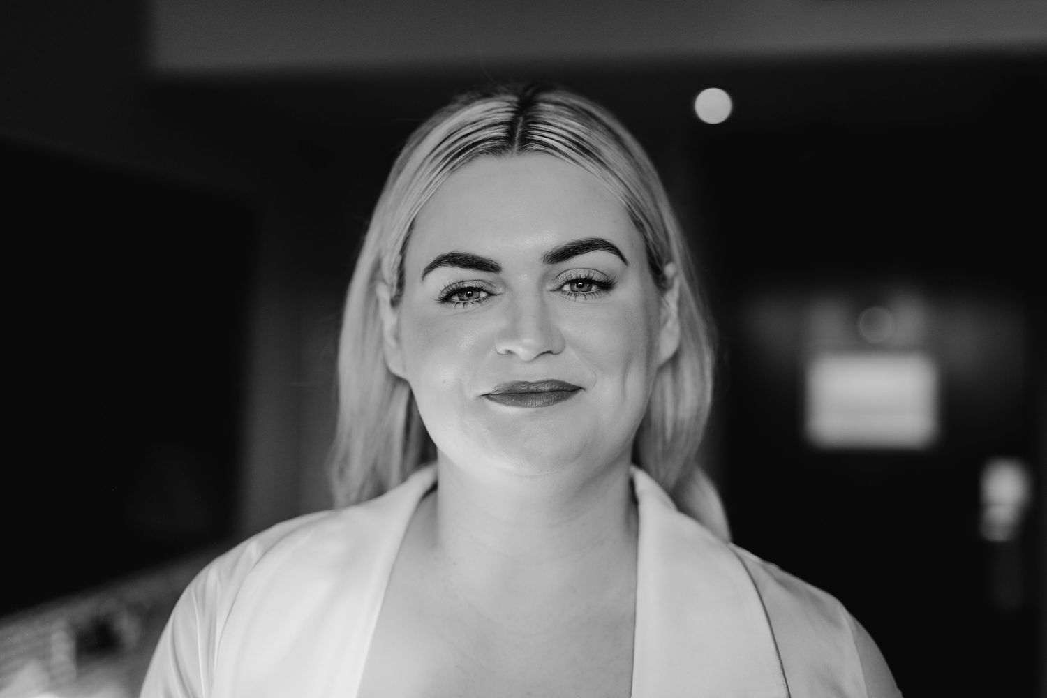 A black and white collage of headshots shows a woman in various poses and expressions. Wedding photographer dublin