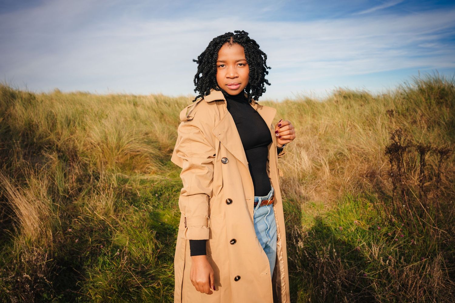 Natural outdoor fashion portrait featuring casual outfit with tan jacket and denim. Dublin professional headshots photographer