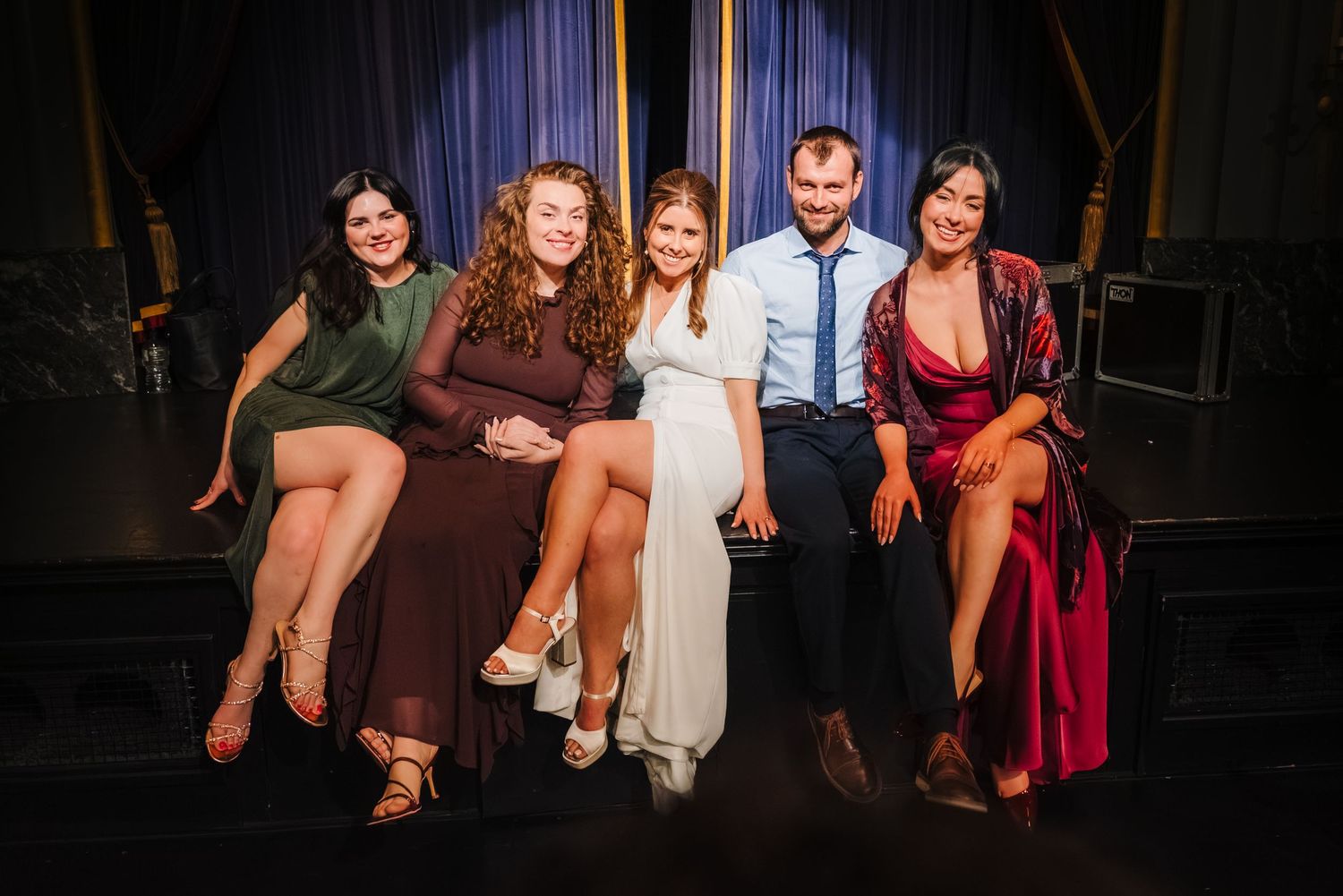 Group of friends dancing and celebrating at a nighttime party or wedding reception. Wedding ceremony at the Set Theatre Langtons Hotel