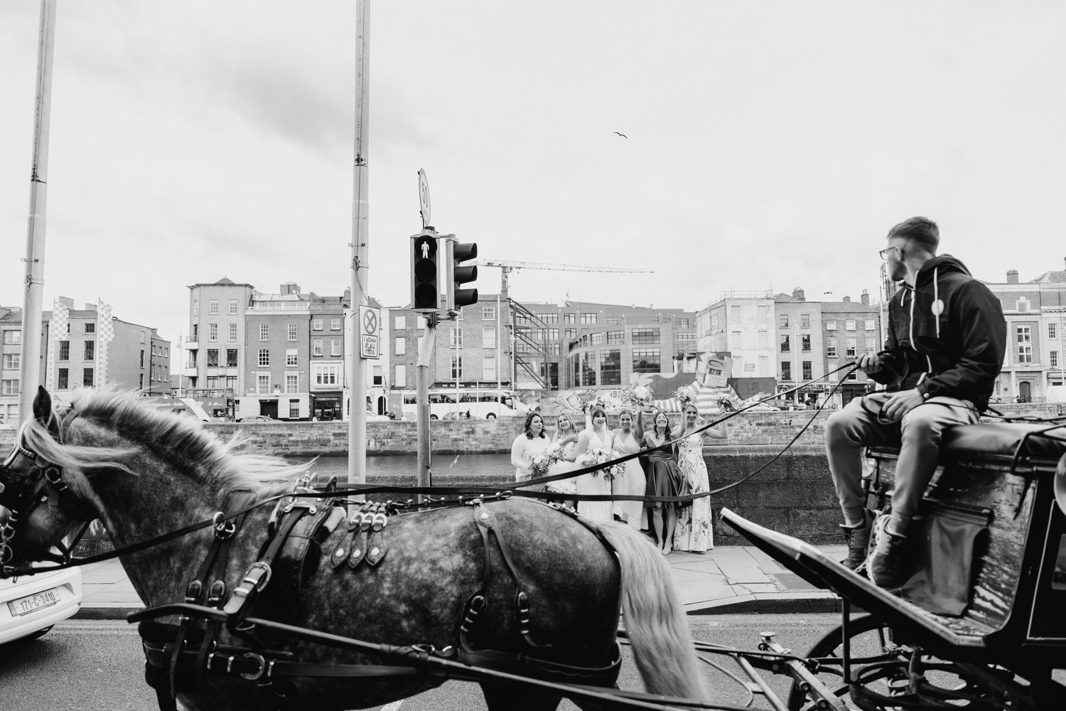 Black and white panoramic urban rooftop scene with city buildings in the background. PHOTOGRAPHER Dublin Ireland Wedding