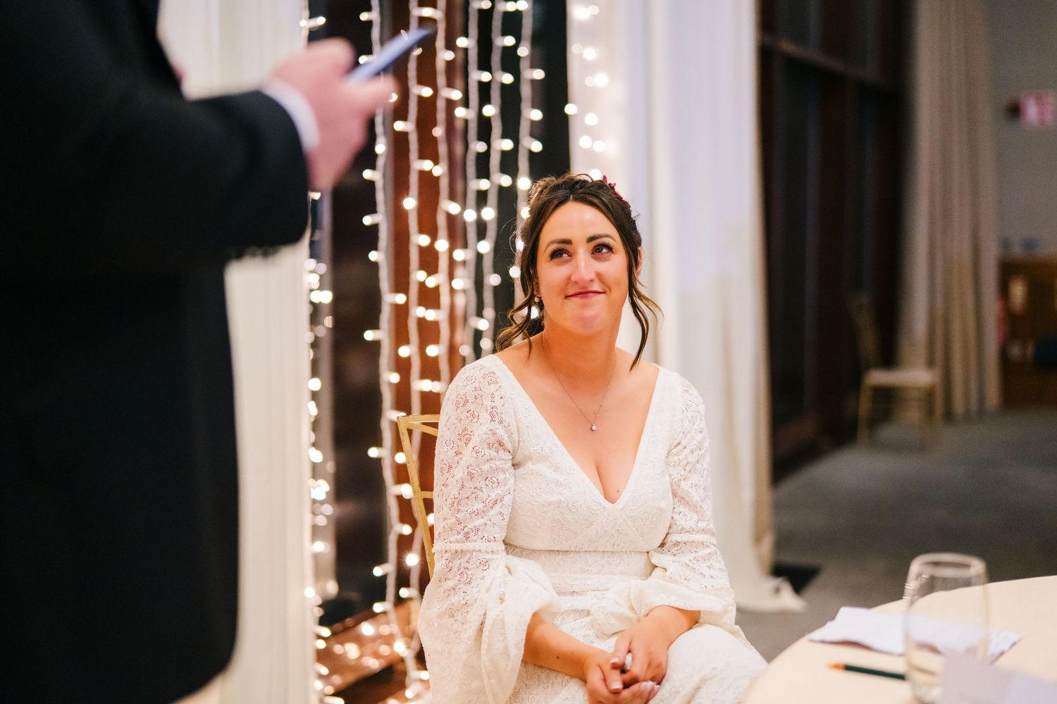 Elegant indoor reception with string lights creating warm ambiance.Wedding Photography Trim Castle Ireland