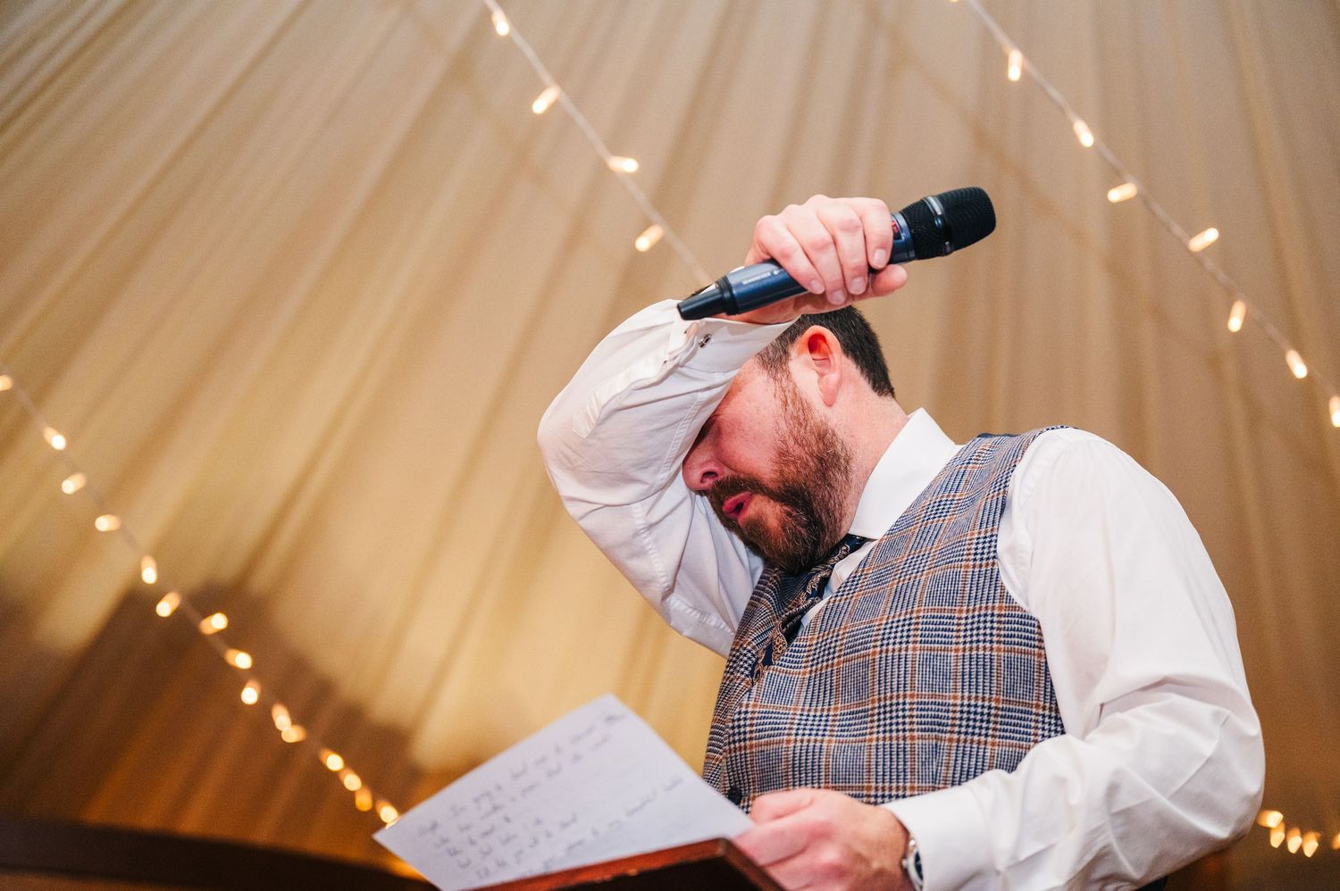 Wedding reception with twinkle lights and fabric draping creating a romantic atmosphere.  Virginia Park Lodge Wedding Photographer Cavan Dub