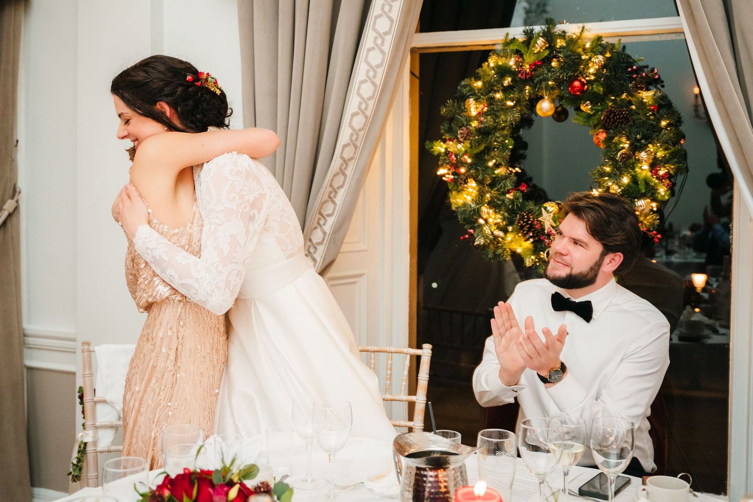 A sequence of wedding photos showing candid emotional moments during speeches at an elegant reception with holiday decor. Wedding Photograph