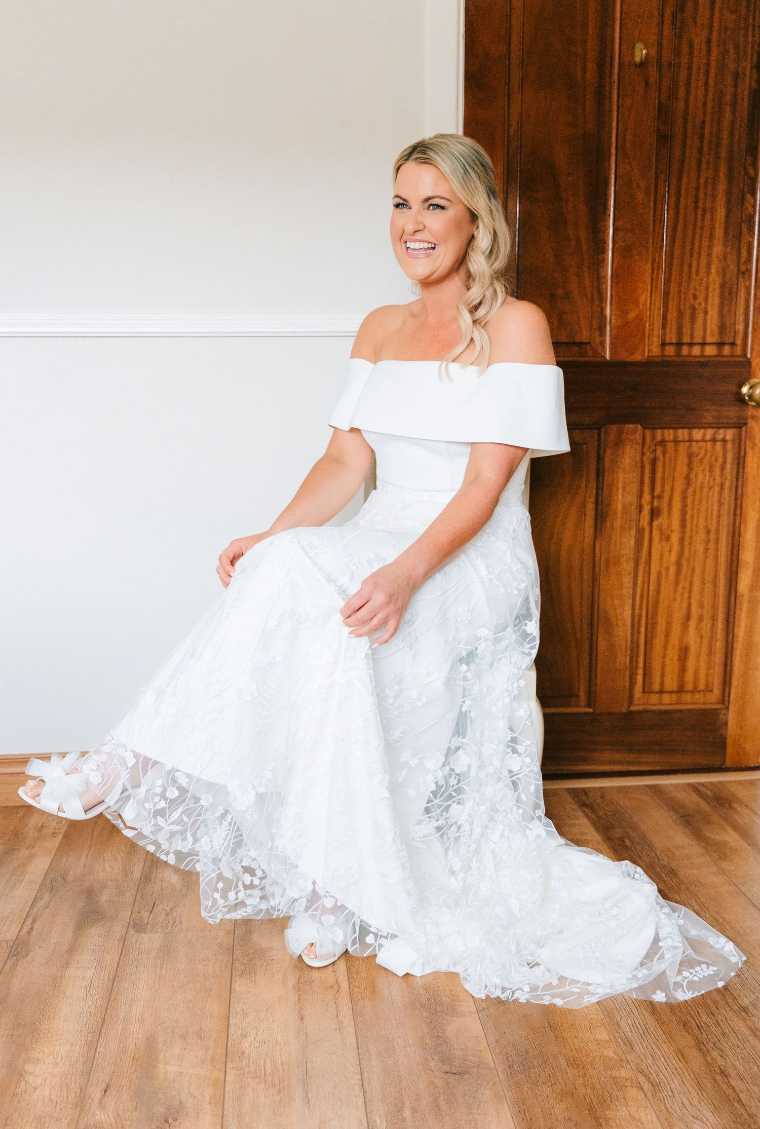 Five sequential photos showing cheerful dance movements in elegant white lace dresses on hardwood flooring. The Dean Dublin Wedding Photogra