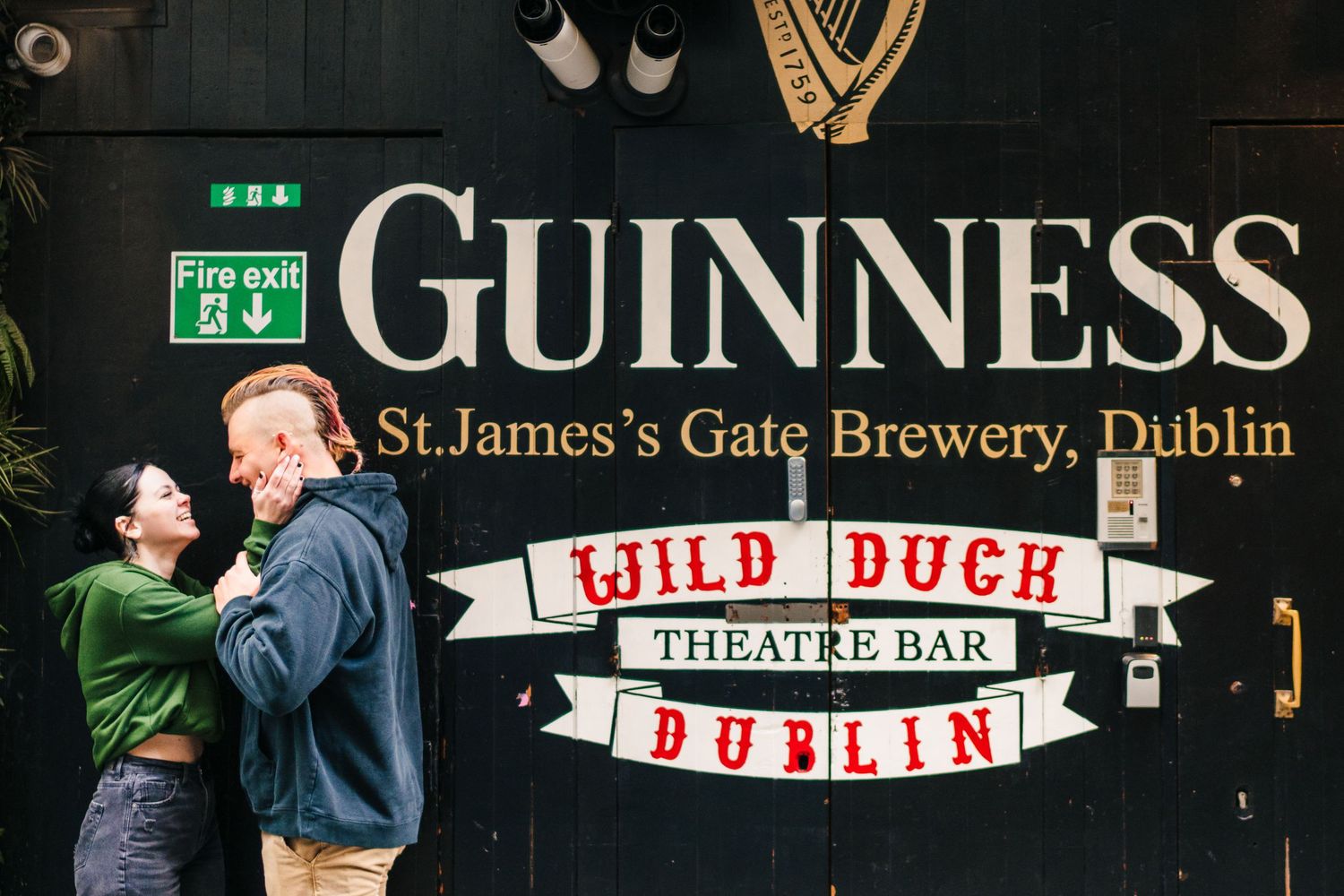 Historic Guinness brewery sign and Wild Duck Theatre Bar entrance in Dublin. PHOTOGRAPHER Dublin Ireland