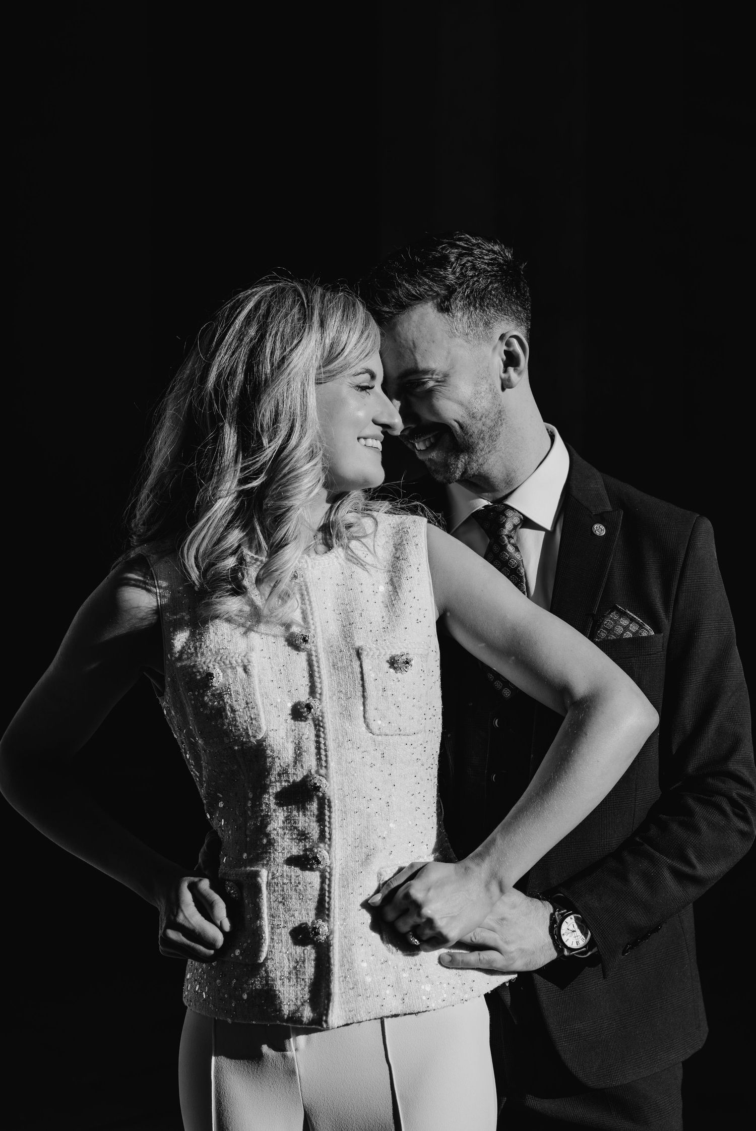 Romantic black and white portraits showing intimate moments between newlyweds. City Hall Dublin wedding photogrAPher