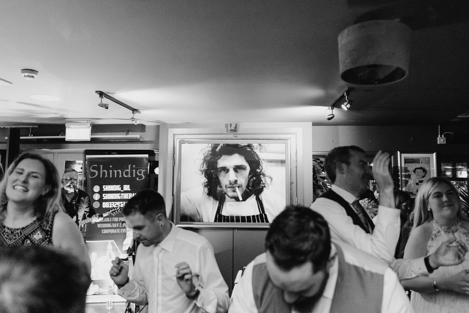 Candid moments captured during wedding prep in bright indoor setting. Marco Pierre Dublin Wedding Photographer