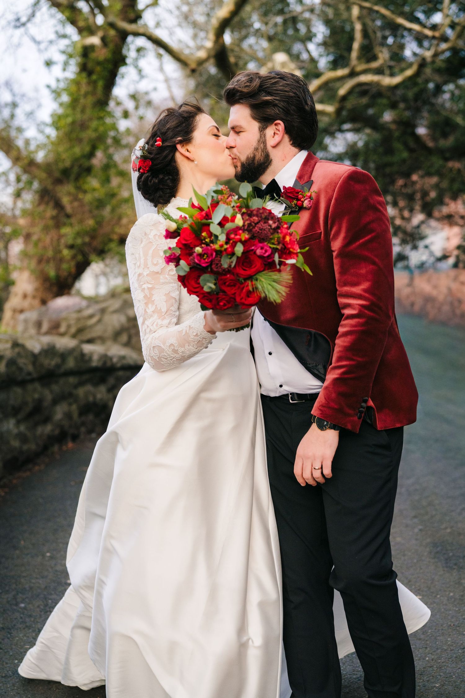 Wedding photographer dublin meath cavan. jacket and white dress against a natural outdoor backdrop. Stephens green club dublin
