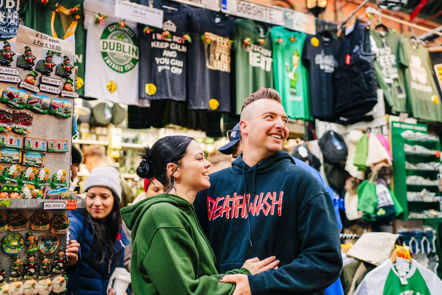 Inside a Guinness merchandise shop with beer memorabilia and t-shirts hanging on display. PHOTOGRAPHER Dublin Ireland