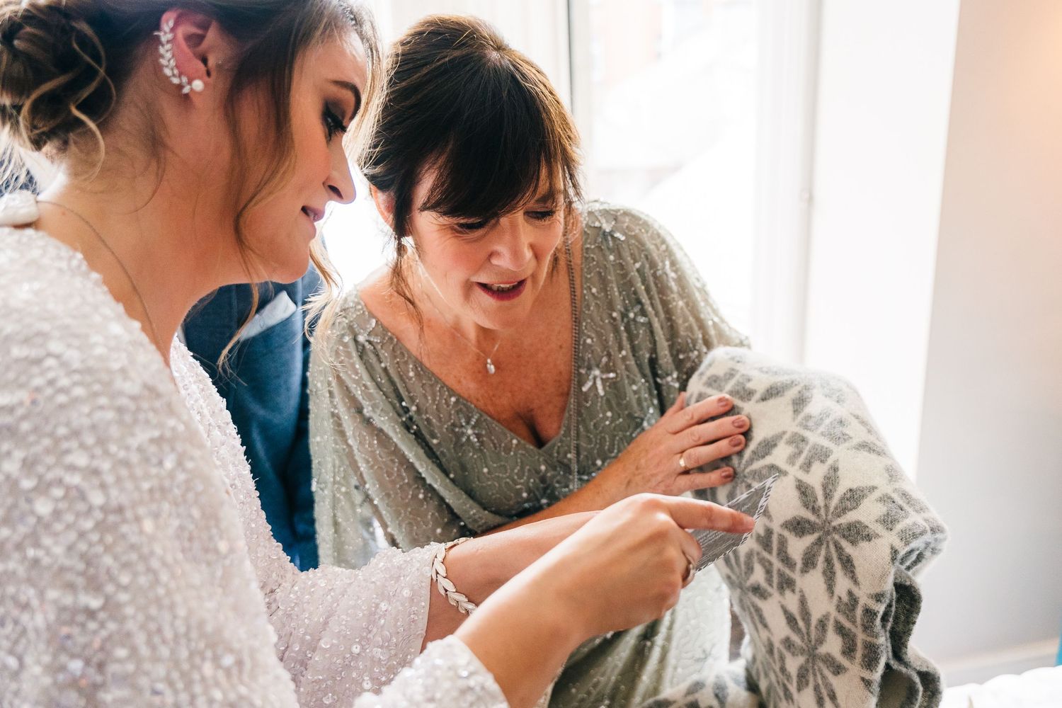 Candid reactions and embraces captured during wedding preparation moments. House Dublin Wedding Photographer