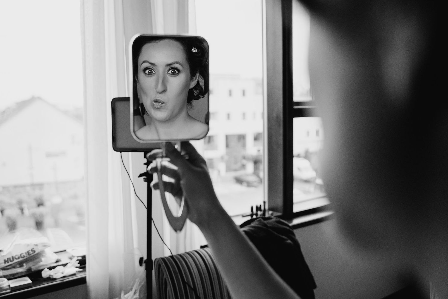 Black and white photographic portraits showing emotional expressions in natural window light. Wedding Photography Trim Castle Ireland