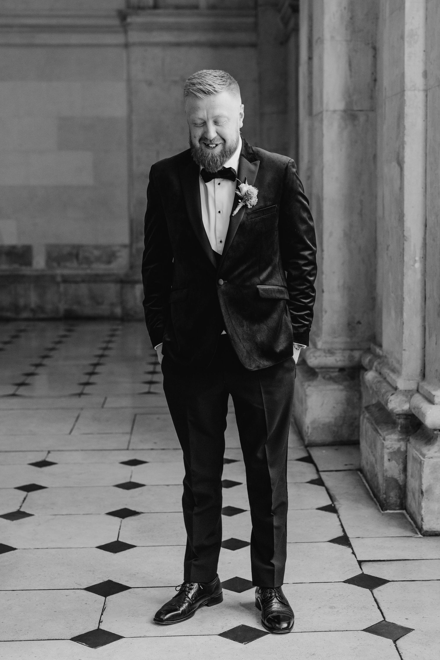 A sequence of black and white photos showing a person in a tuxedo posing playfully on a checkered floor. Wedding photographer dublin