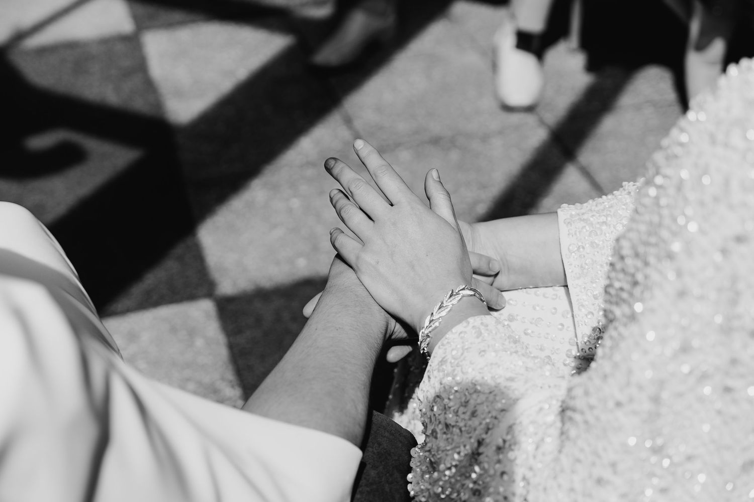 Black and white photo showing wedding dress details and candid moments. House Dublin Wedding Photographer