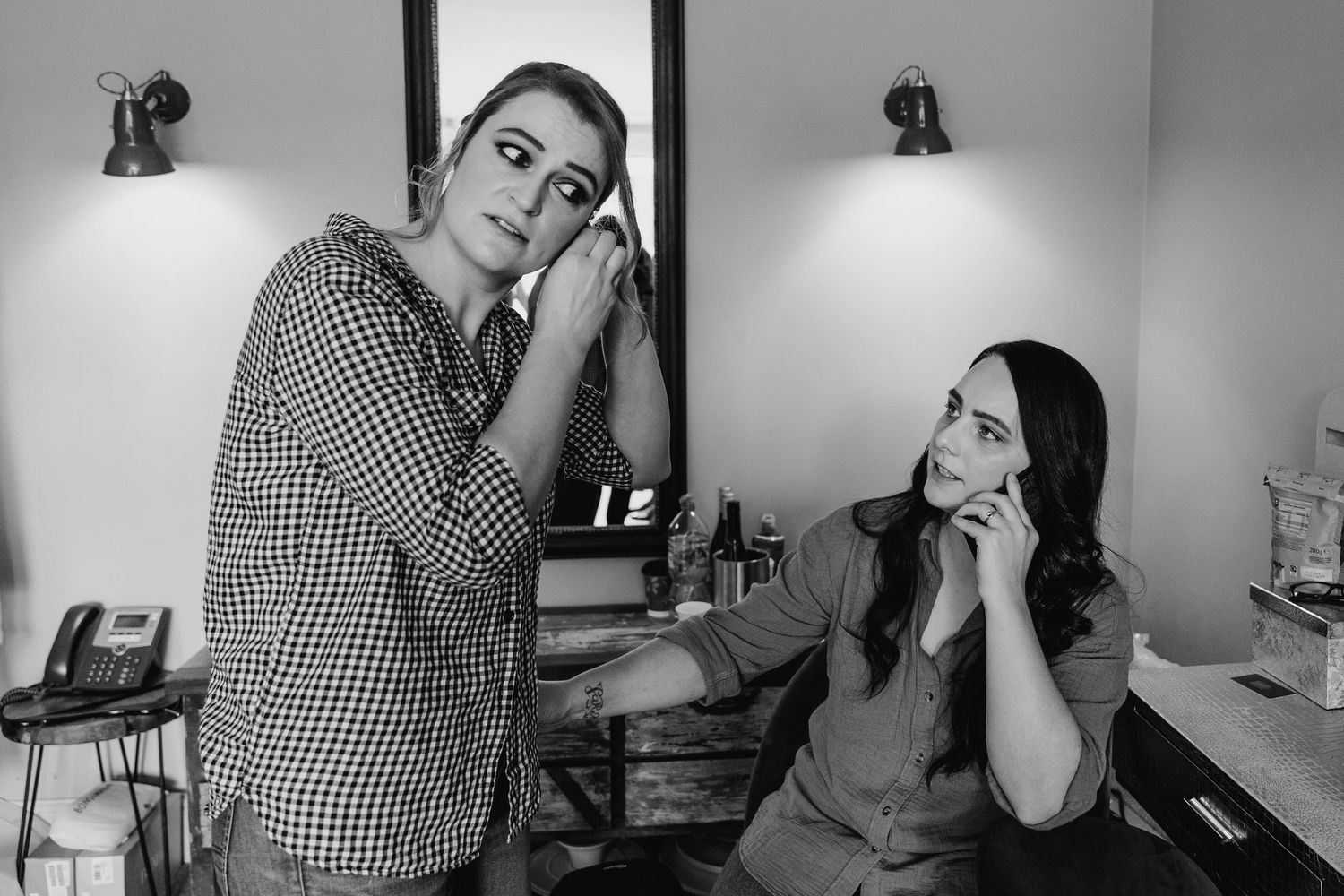 Black and white photo of people in casual attire during an indoor gathering. House Dublin Wedding Photographer