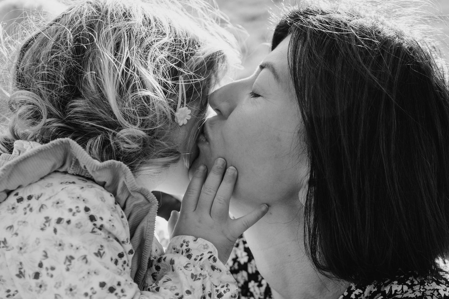 Black and white photo montage showing tender romantic moments between couples in intimate poses. family PHOTOGRAPHER Dublin