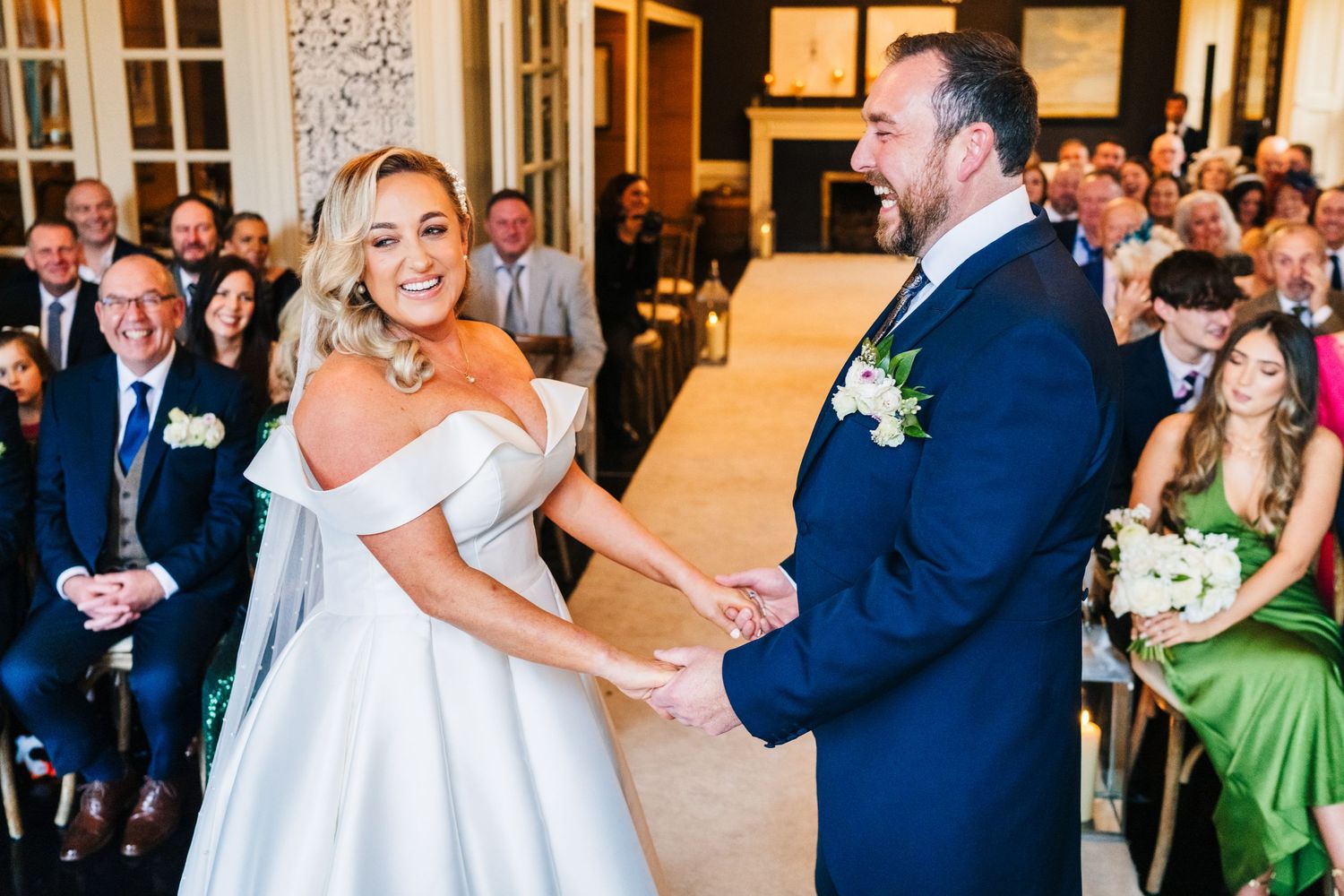 Wedding reception in an elegant ballroom with guests dancing and celebrating.  Virginia Park Lodge Wedding Photographer Cavan Dublin Ireland