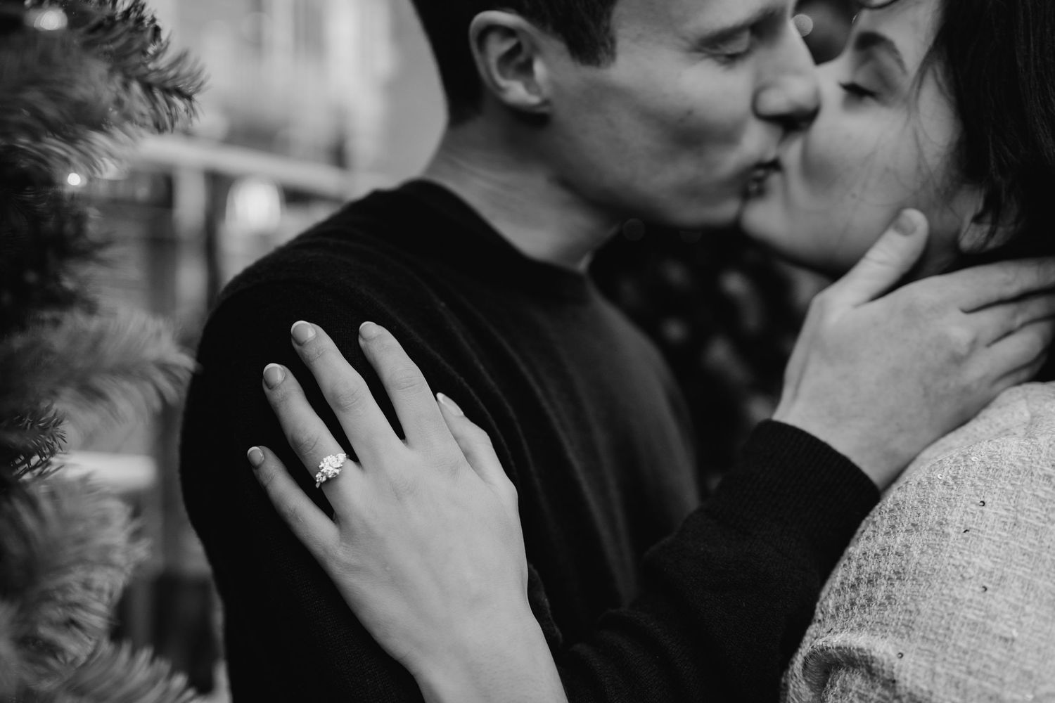 A tender black and white portrait of a couple sharing an intimate moment. Surprise proposal dublin photography