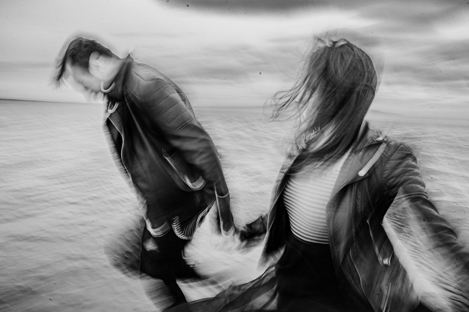 Black and white artistic sequence of hair movement with repeating motions captured against a cloudy sky backdrop. PHOTOGRAPHER Dublin irelan