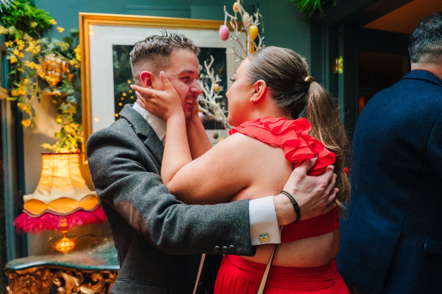 Intimate moment between a couple dancing at their wedding reception.