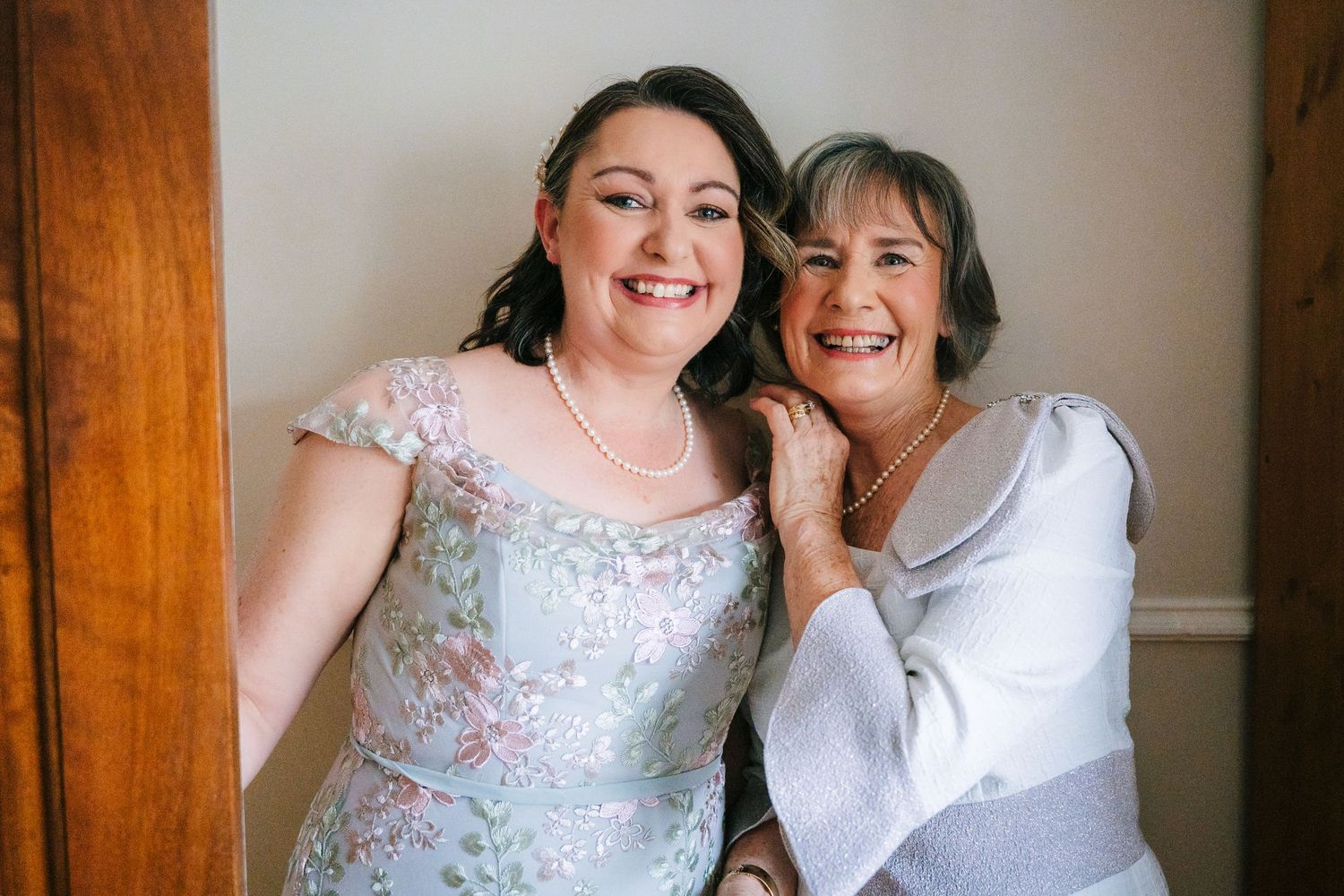 Sweet candid moments between two people in formal attire getting ready for a special occasion. The Dean Dublin Wedding Photographer