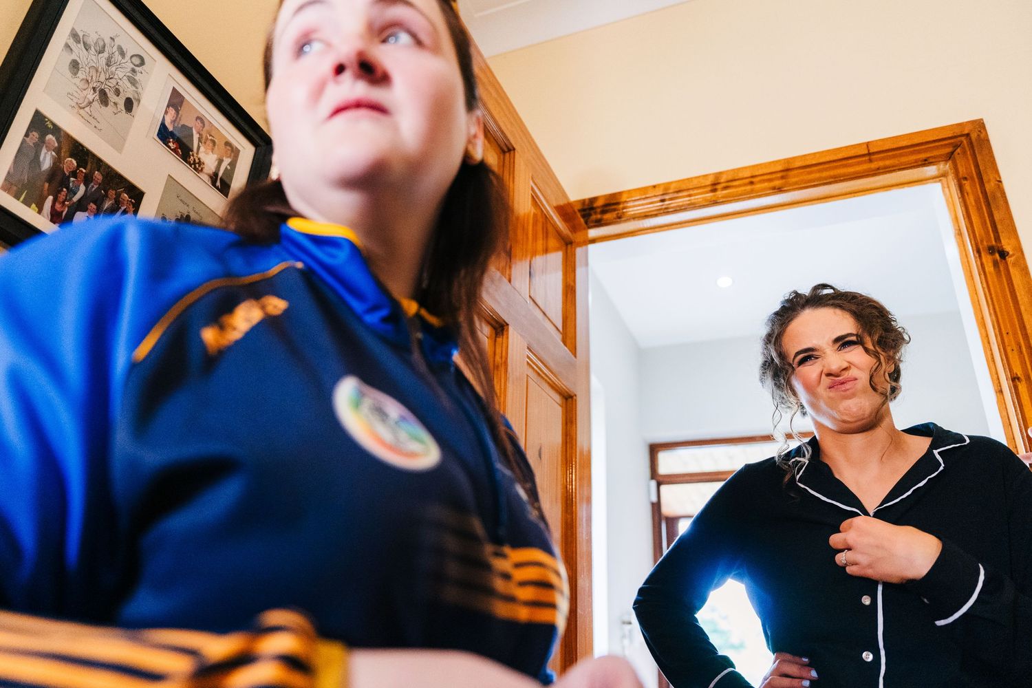 Paramedic team wearing blue uniforms discuss patient care during a medical emergency response call.Millhouse slane wedding photographer dubl