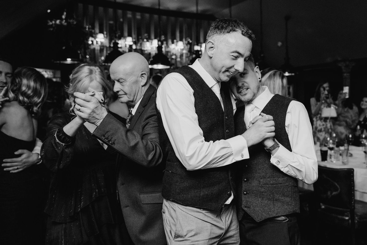 Black and white photos of dancing and celebration at evening event. Marco Pierre Dublin Wedding Photographer