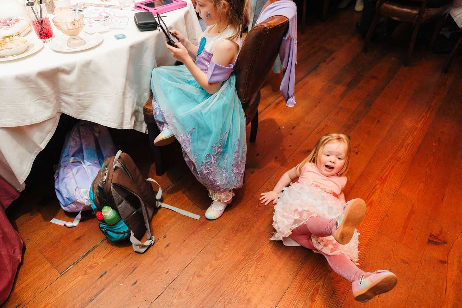 People dancing in formal attire at a wedding reception on a hardwood floor. Marco Pierre Dublin Wedding Photographer