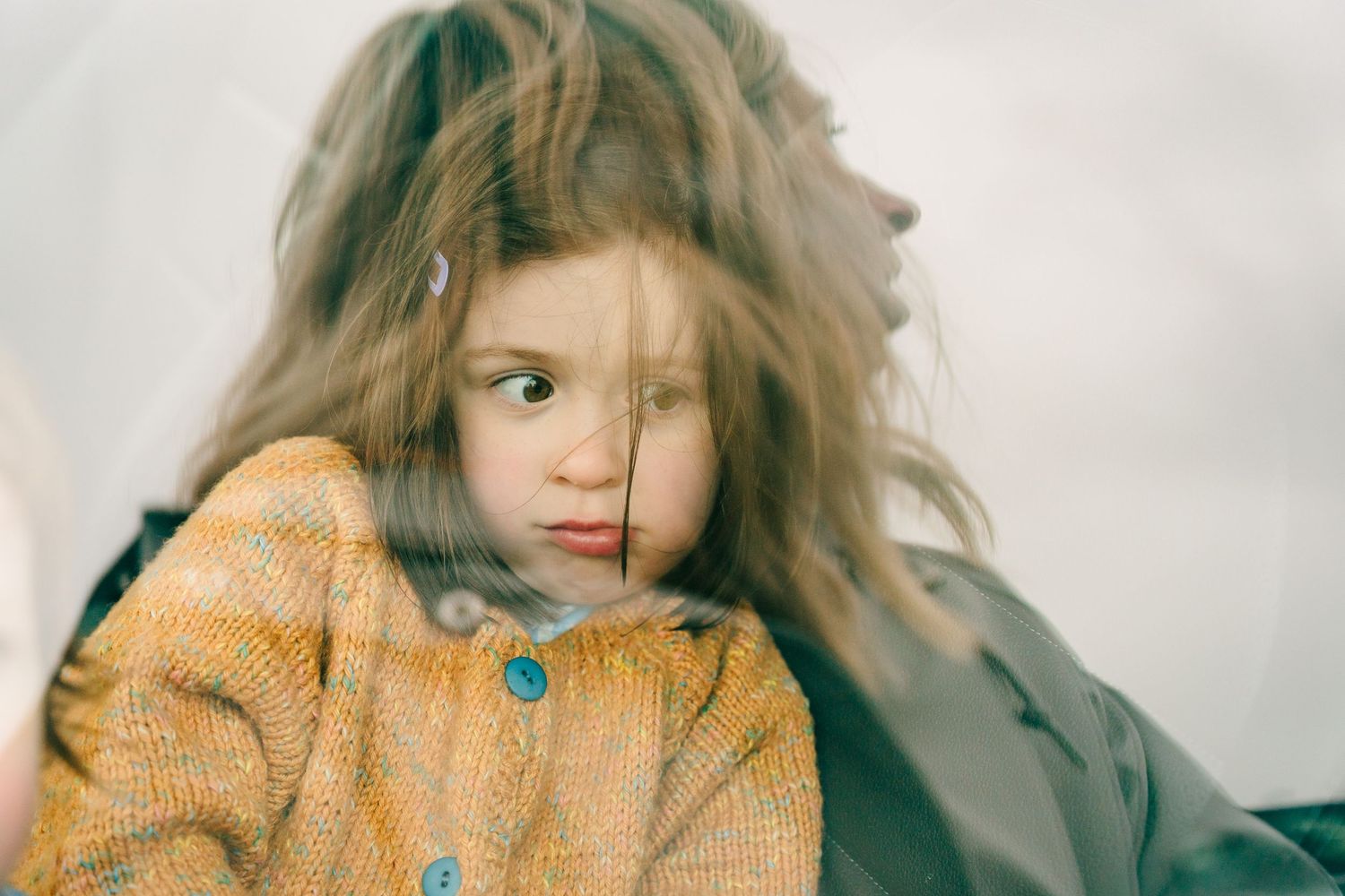 Close-up portraits showing warm tones and natural expressions against a simple background. PHOTOGRAPHER Dublin