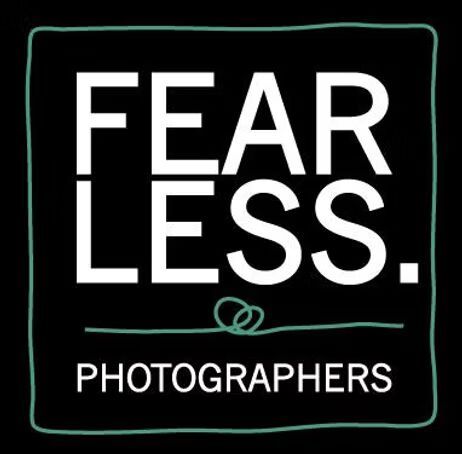 Black square logo design with text 'FEAR LESS' and 'PHOTOGRAPHERS' in white with turquoise accents. wedding photographer dublin