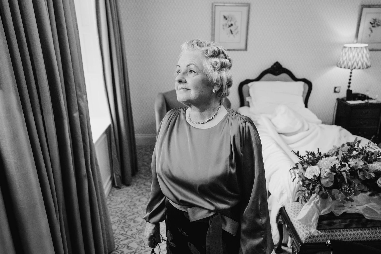 Black and white portraits showing quiet moments of reflection before a wedding ceremony.