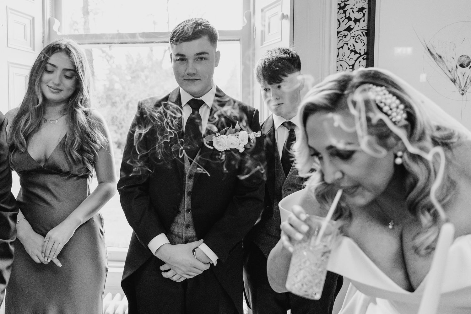 Black and white wedding party photo showing pre-ceremony moments and preparations.  Virginia Park Lodge Wedding Photographer Cavan Dublin Ir