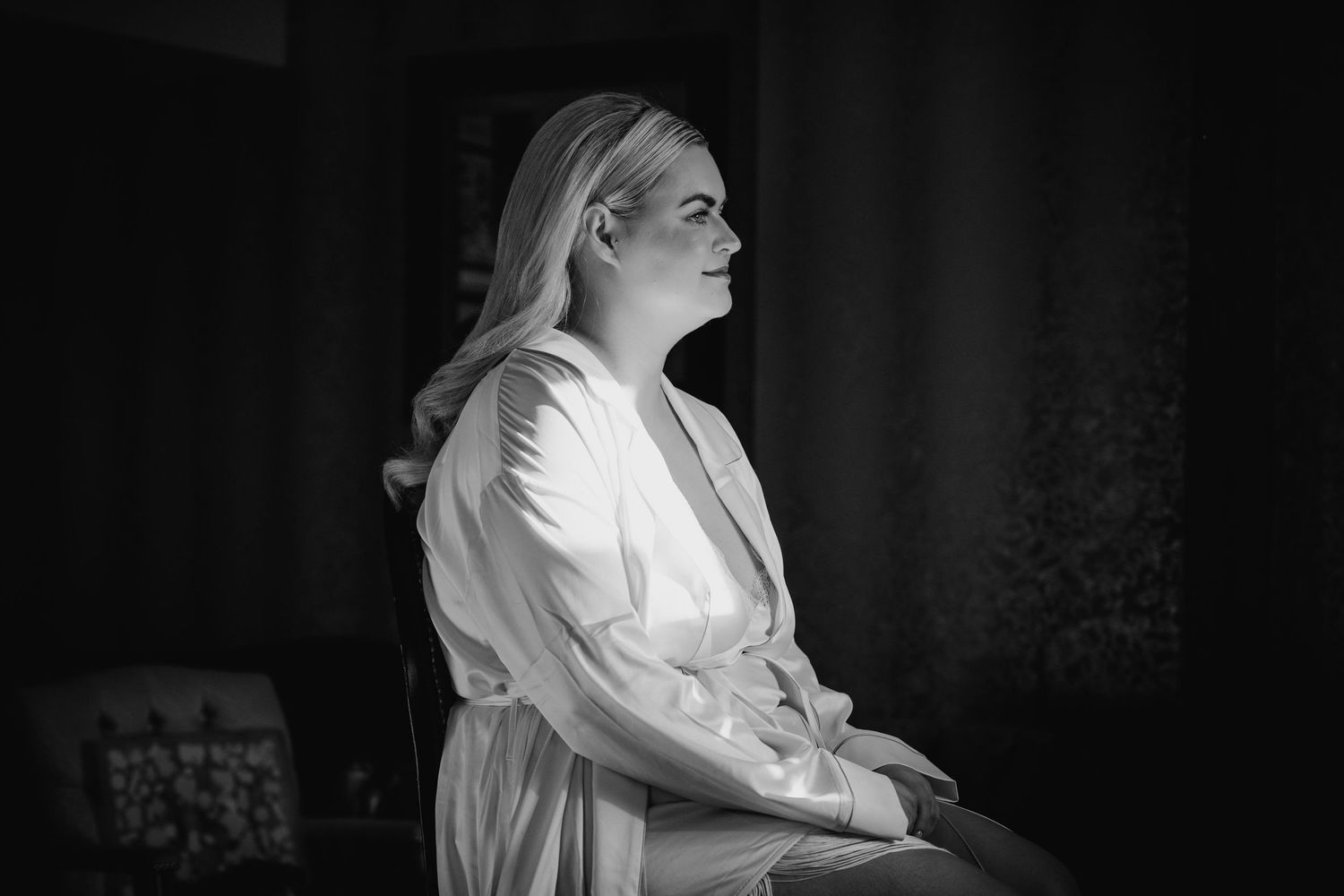 Black and white photos of bridal preparations with soft lighting and elegant composition. Wedding photographer dublin