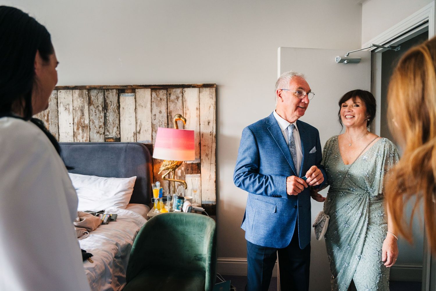 Small grid of candid moments showing people sharing stories and laughing in natural lighting. House Dublin Wedding Photographer