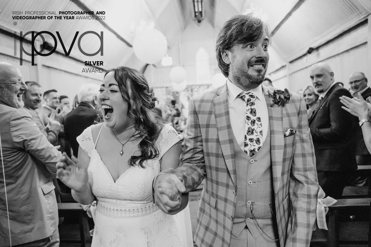 A celebratory moment of joy at a wedding reception. PHOTOGRAPHER Dublin Wedding PHOTOGRAPHER Dublin